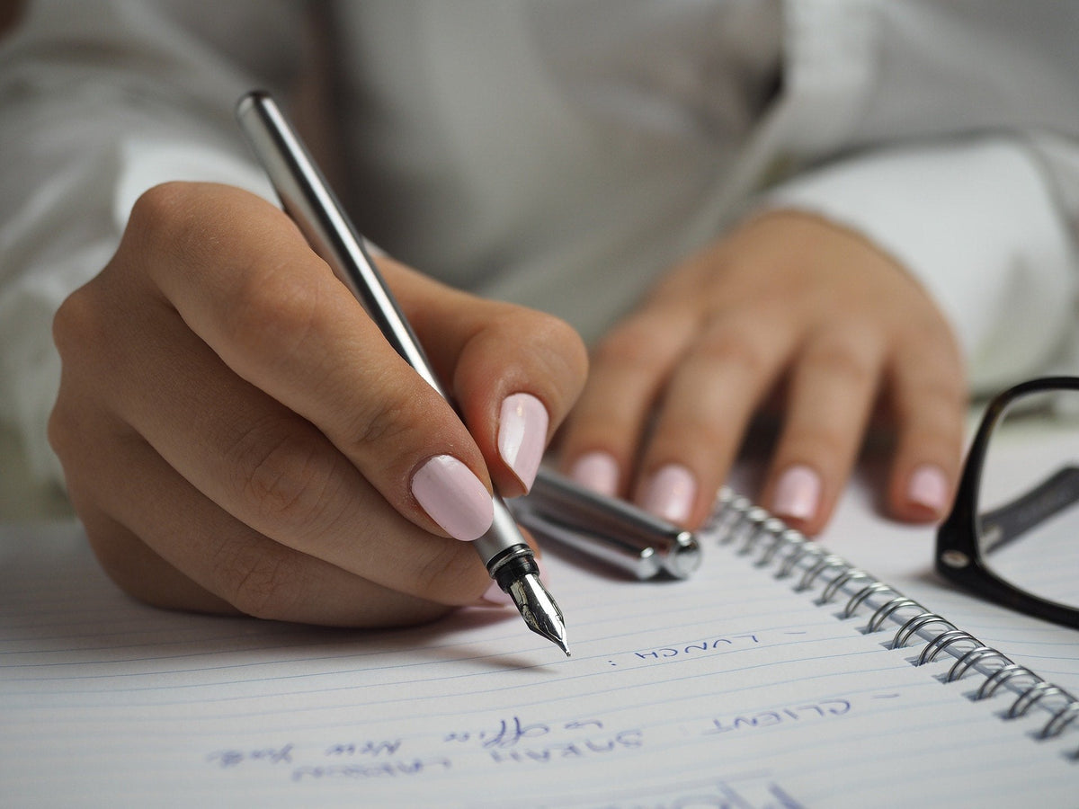 Writing by hand or typing by lap?