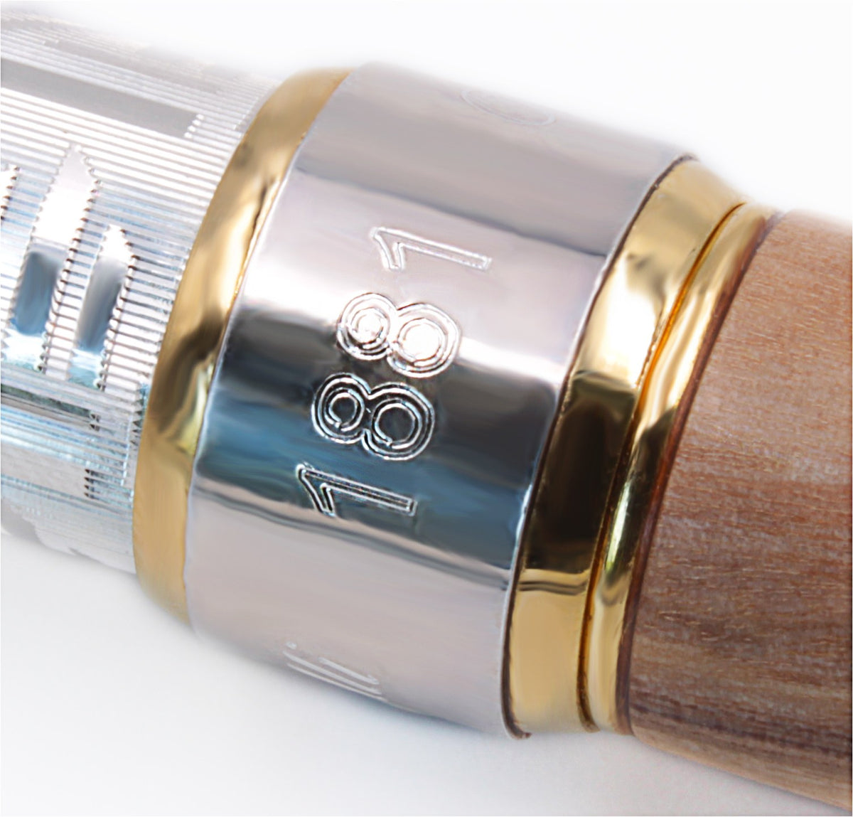 Number 1881 engraved on the silver ring of a pen