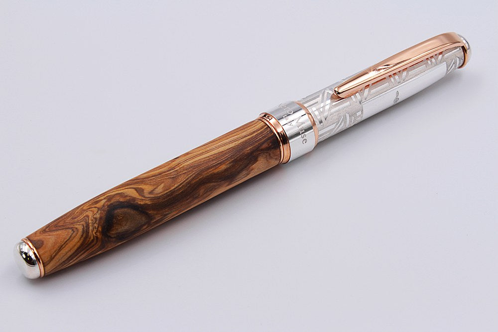 Olive wood and silver fountain pen with an engraving on the ring