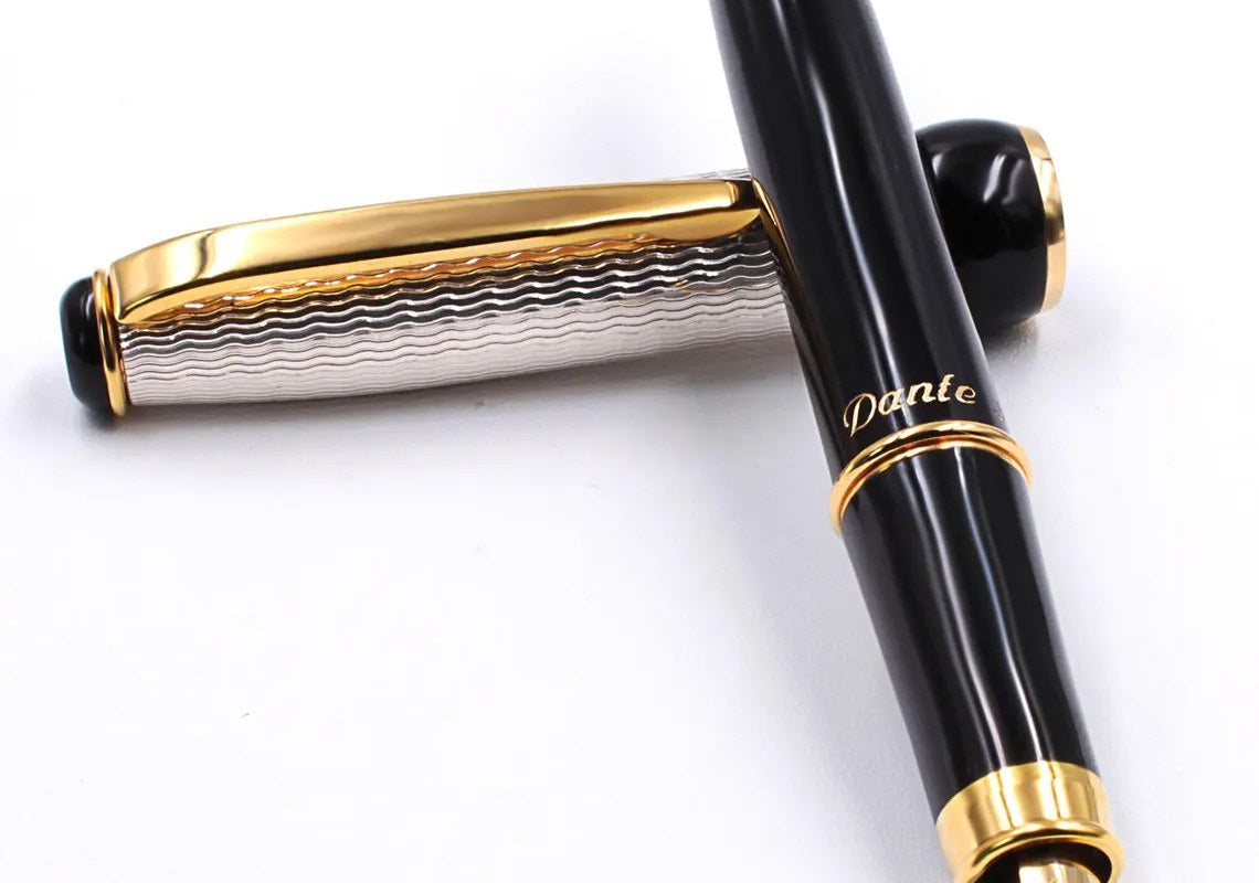 Black fountain pen with the name Dante engraved on the barrel
